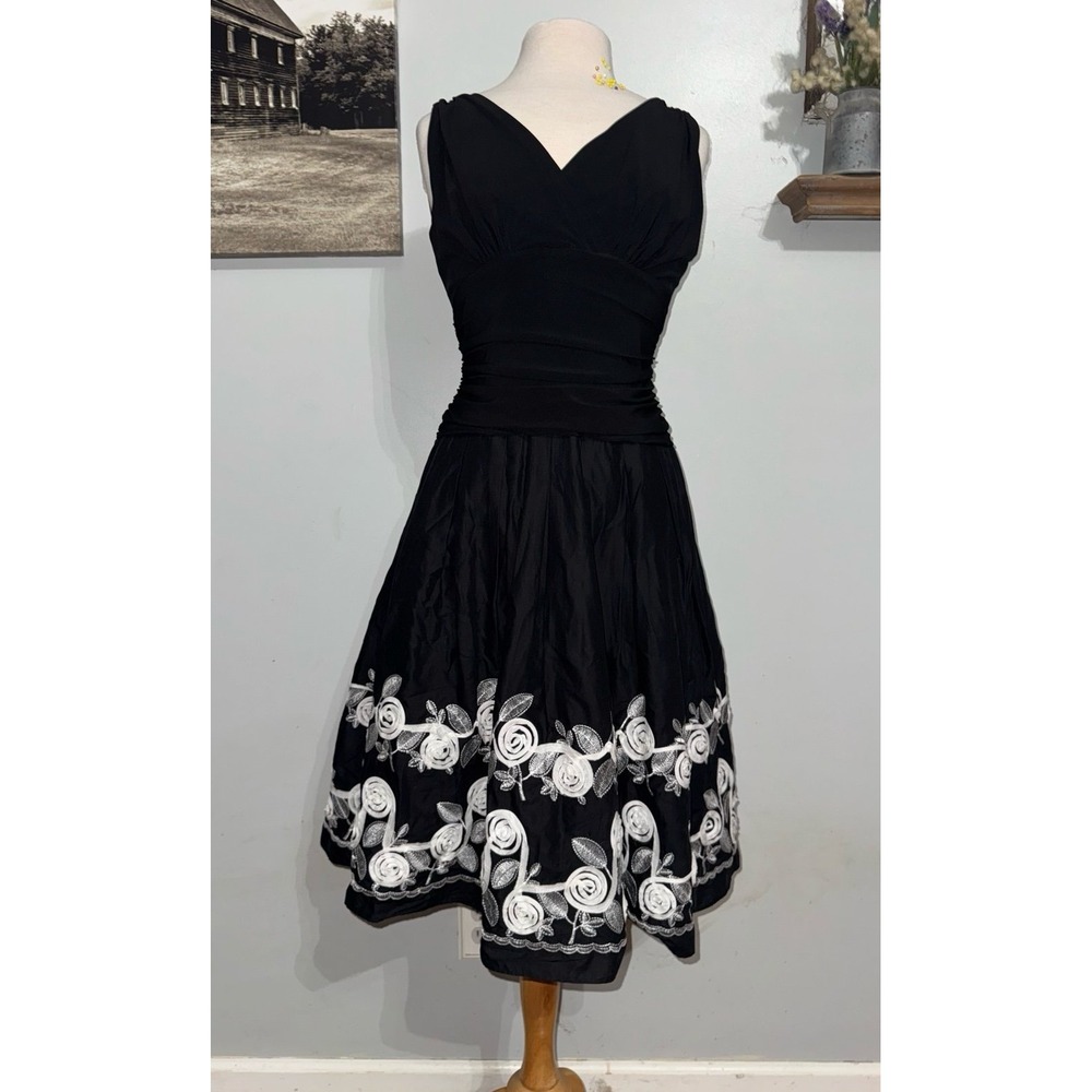 Vintage SL Fashions 50's inspired full skirted black dress tagged‎ a size 12